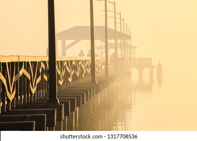 Beautiful Foggy Tampa Morning With Dock Architecture And Sunrise