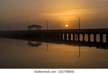 Beautiful Foggy Tampa Morning With Dock Architecture And Sunrise