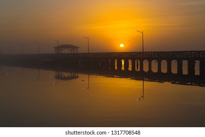 Beautiful Foggy Tampa Morning With Dock Architecture And Sunrise