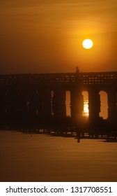 Beautiful Foggy Tampa Morning With Dock Architecture And Sunrise