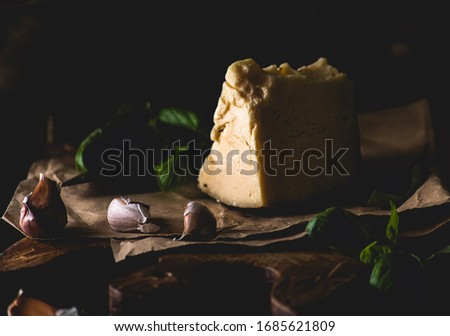 
beautiful foodstyling of the ingredients of pesto, Italian condiment of great use in the kitchen, to accompany pasta, meat and even salads. It is also amazing with homemade bread. Stock photo © 