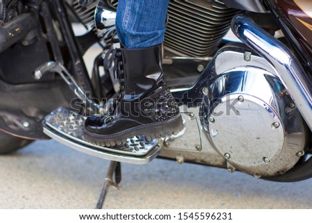 Similar – Image, Stock Photo Couple sitting over motorcycle ready to go