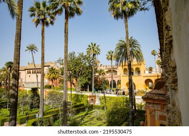 Beautiful Formal Public Garden Inside Alcazar Seville Palace In Summertime In Andalusia