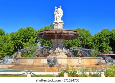 Beautiful Fountain In Sunny Square Surrounded By Trees, Aix En Provence, Languedoc Roussillon, France