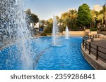 Beautiful fountains in the city park of Rishon Lezion in Israel in summer evening