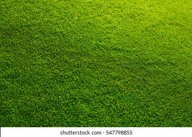 Beautiful Fresh Green Grass Texture From Golf Course, Selective Focus With A Blurred Background.