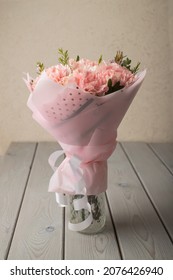 Beautiful Fresh Spring Flowers On A Wooden Table, Side View Of The Delicate Pastel Tone Of The Image.