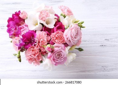 Beautiful Fresh Spring Flowers On Wooden Table, Top View