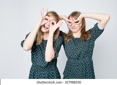 Beautiful and funny  two twins sisters together 