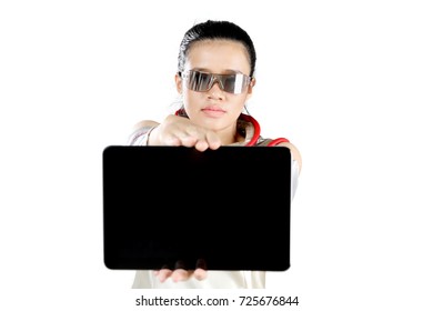 Beautiful futuristic woman showing a blank digital tablet screen while wearing glasses, isolated on white background