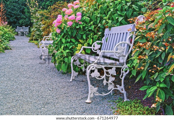 Beautiful Garden Bench On Gravel Path Stock Photo Edit Now 671264977