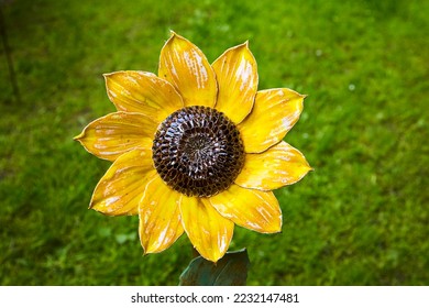 Beautiful garden decoration, a flower replica made of ceramic, (Sunflower replica). - Shutterstock ID 2232147481