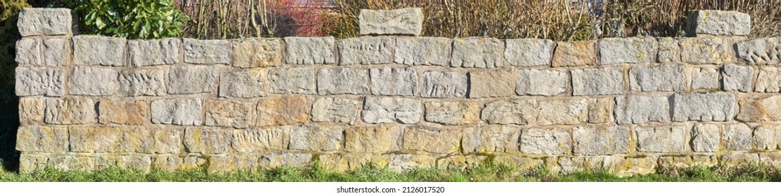 Beautiful Garden Wall Created With Sandstone Blocks.