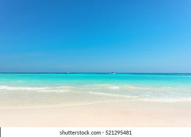 Beautiful Gentle Wave At Tropical Beach With Clear Sky