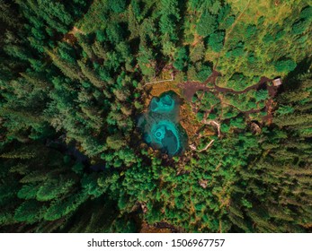 Beautiful Geyser Lake With Thermal Springs That Periodically Throw Blue Clay And Silt From The Ground. Aerial Dron View, Altai Mountains, Russia