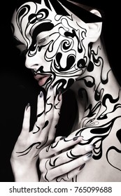 Beautiful girl and art black   white makeup   nails  Creative beauty face  Photo taken in the studio 