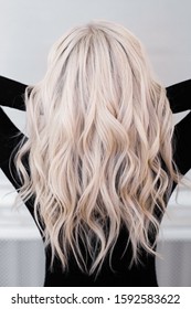 Beautiful Girl Back With Light Natural White Blonde Wavy Hair Isolated