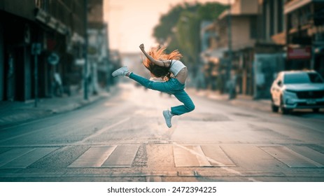 Beautiful girl ballerina dancing. Ballerina Performance Street Show in the city. A teenager poses as a ballet performer at a tourist attraction, in Chiang Mai, Northern Thailand. Sport and Recreation. - Powered by Shutterstock