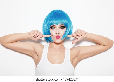 Beautiful Girl With Blue Hair Standing On White Background. Studio Shot.