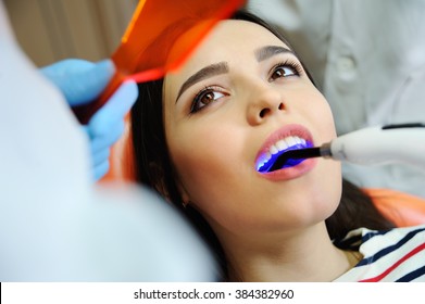 Beautiful Girl At The Dentist. Dental Fillings