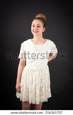 Beautiful girl doing different expressions in different sets of clothes: smile