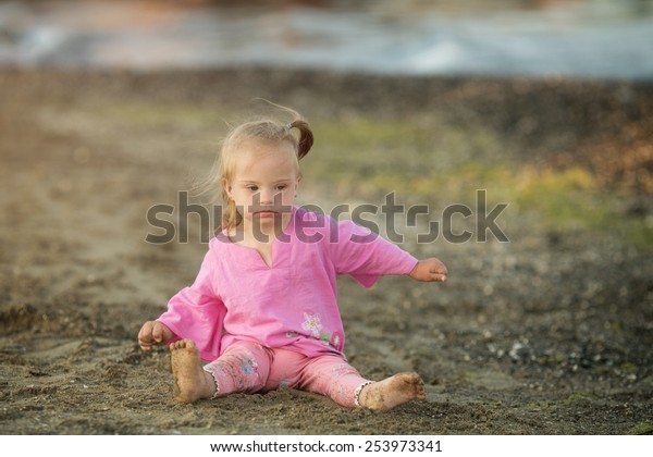 Beautiful Girl Down Syndrome Playing On Stock Photo (Edit Now) 253973341