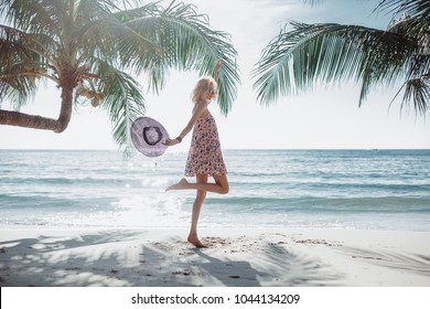 Beautiful Girl In A Dress And Sunglasses Posing On The Beach, Beauty Portrait, Fashion Woman, Red Lipstick, Tanned Skin, Portrait, Sea, Sunny Island, Bali, Hat, Cap, Jump, Palms