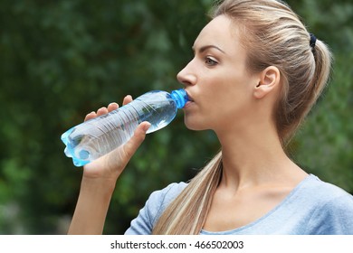 Smiling Pretty Young Woman Drinking Water Stock Photo (Edit Now) 1645299886