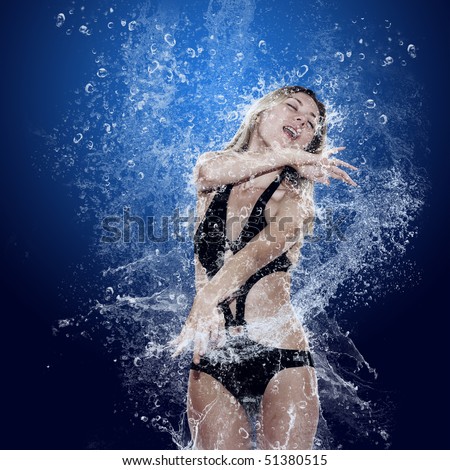 Beautiful girl in drops under water