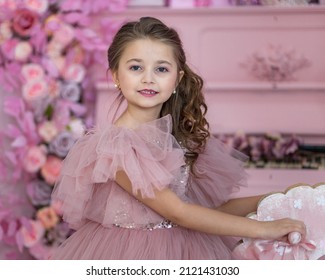 a beautiful girl in a fluffy airy pink dress, near a pink piano, a piano with a huge number of flowers, a lot of flowers, in a festive mood, congratulates everyone on Valentine's Day, Valentine's Day 
