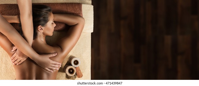 The Beautiful Girl Has Relaxing Massage. Spa Treatment. Design Template With The Space For Placing Text