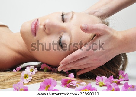 Beautiful girl having massage in spa , Enjoy nice time...