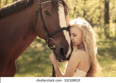 beautiful girl and a horse