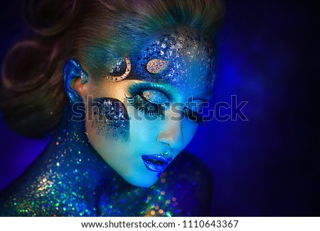 Beautiful girl in the image of the zodiac signs of fish