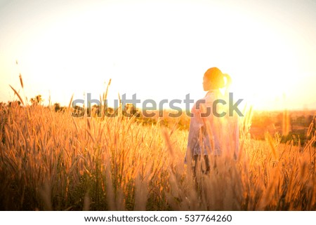 Similar – Image, Stock Photo Young woman looking at the sunset.