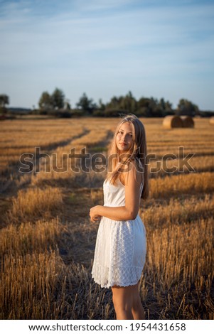 Similar – Image, Stock Photo laughing, blonde woman, sunset, field