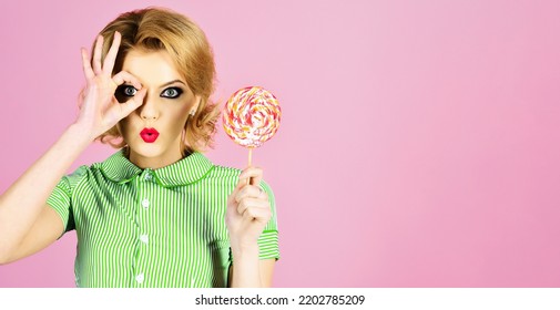 Beautiful Girl With Lollipop Shows Sign Ok. Woman In Summer Style With Colourful Candy. Sweet Food.