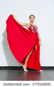 Beautiful Girl In Long Red Satin Dress Embroidered With Mirror Plates