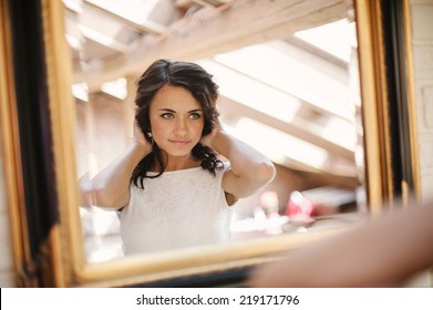 Beautiful Girl Looking In The Mirror.