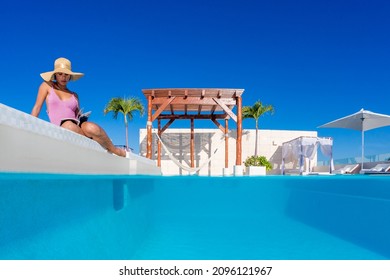 Beautiful Girl In Luxury Rooftop Pool