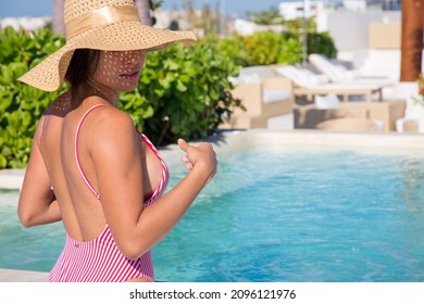 Beautiful Girl In Luxury Rooftop Pool