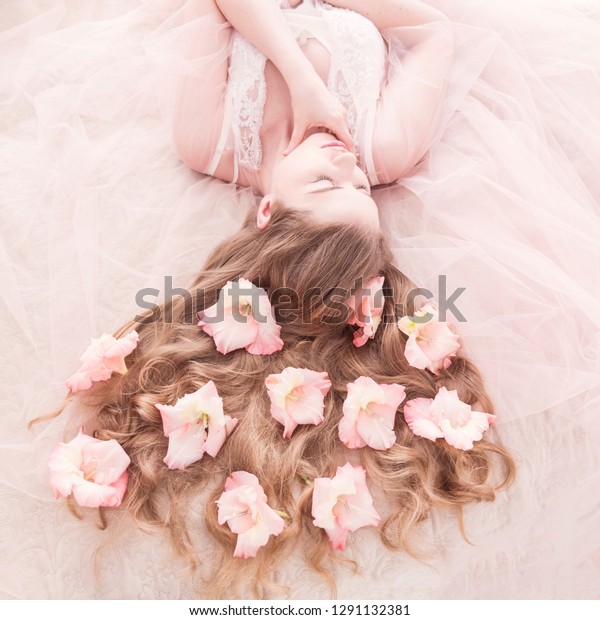 Beautiful Girl Lying On Bed Flowers Stock Photo Edit Now 1291132381