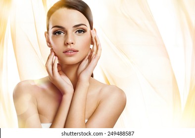 Beautiful girl with beautiful makeup, youth and skin care concept / photoset of attractive brunette girl on beige background 