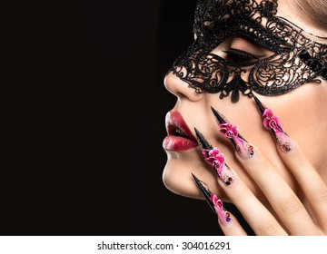 Beautiful Girl In Mask With Long Nails And Sensual Lips. Beauty Face.