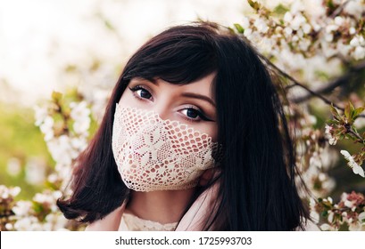 
Beautiful Girl In A Mask On Her Face