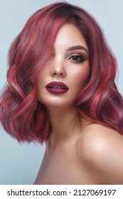 Beautiful girl and multi  colored hair   classic make  up   hairstyle  Beauty face 