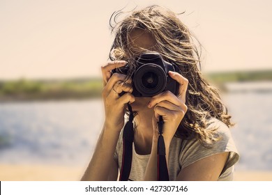 beautiful girl on the beach sitting on the sand photographs - Powered by Shutterstock