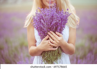 Beautiful girl on the lavender field
