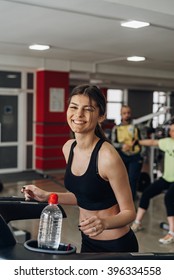 Beautiful girl on a treadmill