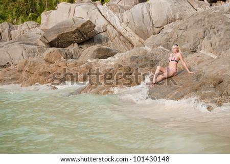 Beautiful girl on a tropical beach. Thailand